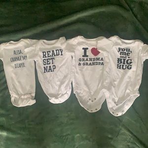 Four onesies 0-3 months